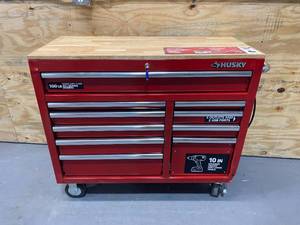 lot 90 image: HUSKY 42 in. W x 18.1 in. D Standard Duty 10-Drawer Mobile Workbench Tool Chest with Solid Wood Top in Gloss Red