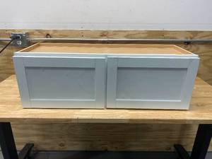 lot 106 image: HAMPTON BAY Courtland Shaker Assembled 36 in. x 12 in. x 12 in. Stock Wall Kitchen Cabinet in Polar White Finish