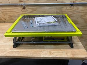 lot 103 image: RYOBI 7 in. 4.8 Amp Tabletop Tile Saw