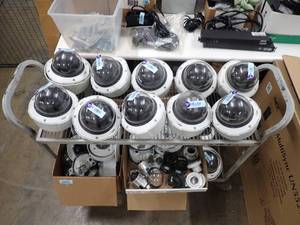 lot 148 image: Security Camera Lot  includes all cameras and parts shown  inspection is suggested for serious bidders  Has 12 assembled and ready to go cameras and lots more that are disassembled (cart not included)(inspection by appt.)