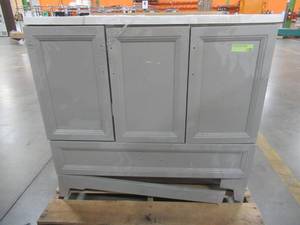 lot 227 image: Style Selections 36-in Smoky Gray Undermount Single Sink Bathroom Vanity with White Cultured Marble Top. Scratch and Dent, Front trim loose.