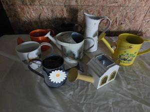 Box Full of Decorative Watering Cans