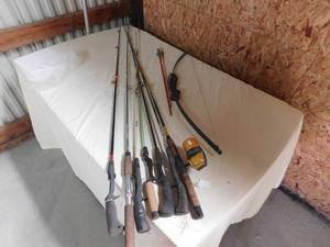 7 Fishing rods and A small Boe and 2 Target Arrows