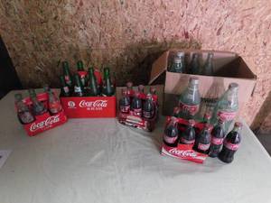 4-33.8oz size Coke Bottles, 3 collectible 6pks, 4 other Coke Bottles & 6-7-Up collector Bottles