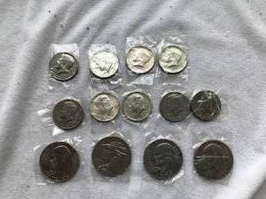 9-Fifty Cent Pieces & 4 0ne Dollar Pieces