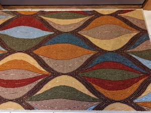 Accent Rug and Decorative Faux Foliage