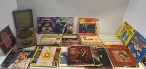 lot 12 image: Group of Vintage RPM Records And Vintage Record Player.