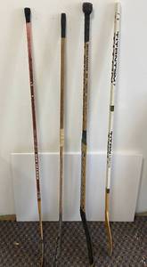lot 63 image: Vintage  Hockey Sticks