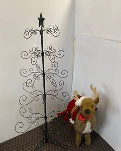 lot 65 image: Large plush Reindeer and Fold up Metal Christmas tree with lights