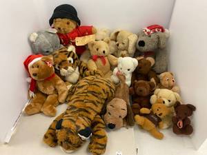 lot 72 image: Group of Vintage stuffed animals including Paddington Bear With Paper Label