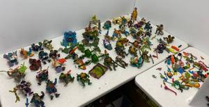 lot 73 image: Large group of Teenage Mutant Ninja turtles and vehicles
