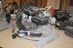 lot 58 image: Delta 36-322L 12 Industrial Compund Laser Miter Saw