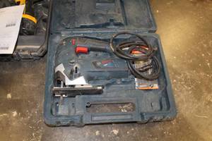 lot 96 image: Bosch JS365 Jig Saw, Extra Jig Saw Blades, Case