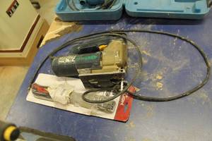 lot 182 image: Bosch Jig Saw (plug missing), Hammer Tacker (in package)