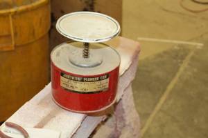 lot 856 image: Plunger Can