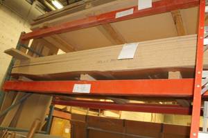 lot 572 image: Stacked Lumber - Light MDF, Particle Board