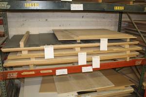 lot 578 image: Stacked Lumber - Black Melamine, White Melamine, MDF, Plywood