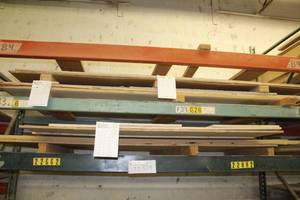 lot 579 image: Stacked Lumber - Baltic Birch, Oak Veneer, MDF, Particle Board, Cherry Veneer, White Melamine, Black Melamine, OSB