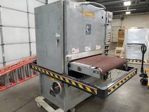 lot 49 image: Timesavers Top Driven 137-2-P73 3-Phase Sander
