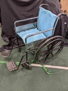lot 49 image: Folding wheel chair...