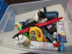 Tote full of various cleaners