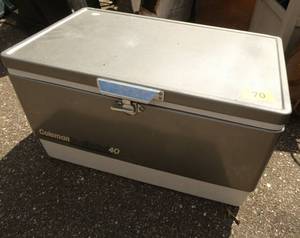 Coleman cooler (hinges are broken) with face shields
