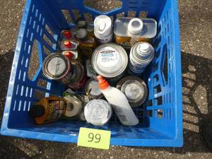 Milk crate of chemicals and paint
