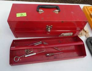 Metal tool box with a bunch of screwdrivers