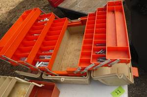 Big fishing tackle box with a bunch of anchors