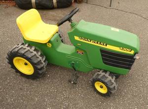 Very cute Plastic riding John Deere tractor for the kids