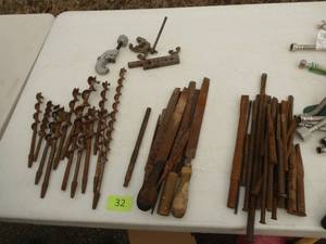 Big lot of chisels, drill bits and files in a tool bag