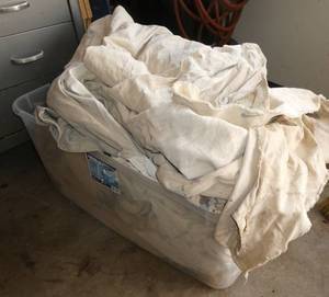 Large tote full of painting drop cloths