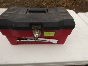 Plastic toolbox full of tie downs