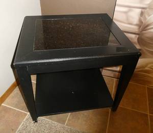 Nice black end table with inset glass