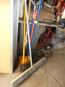 lot of shovels and brooms