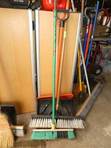 2 brooms and 2 shovels