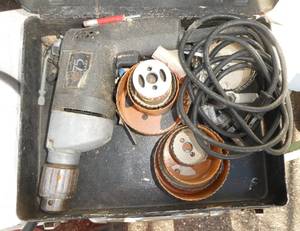 Black and Decker drill with hole saws