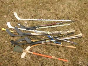 Large lot of hockey sticks