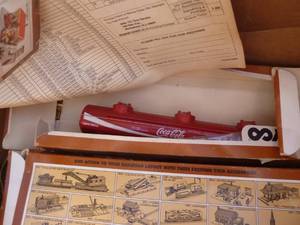 Box of train cars and track