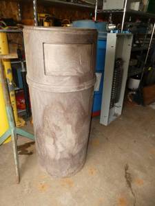 Enclosed waste basket