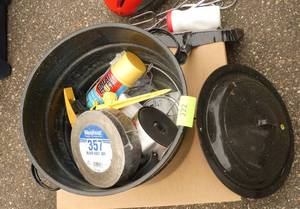 enamel canning kettle, duct tape, sealing foam, sprinkler