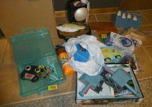 Lot of toys, new soccer ball, Billy Bass singing fish, battleship, snow tube