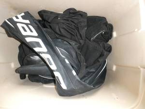 tote of hockey gear, size 10 Bauer skates