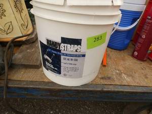 bucket of plastic straps for wiring - 13 to 12 full