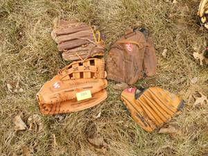 4 baseball gloves