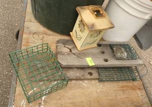 3 Suet cake holders and a candle holder
