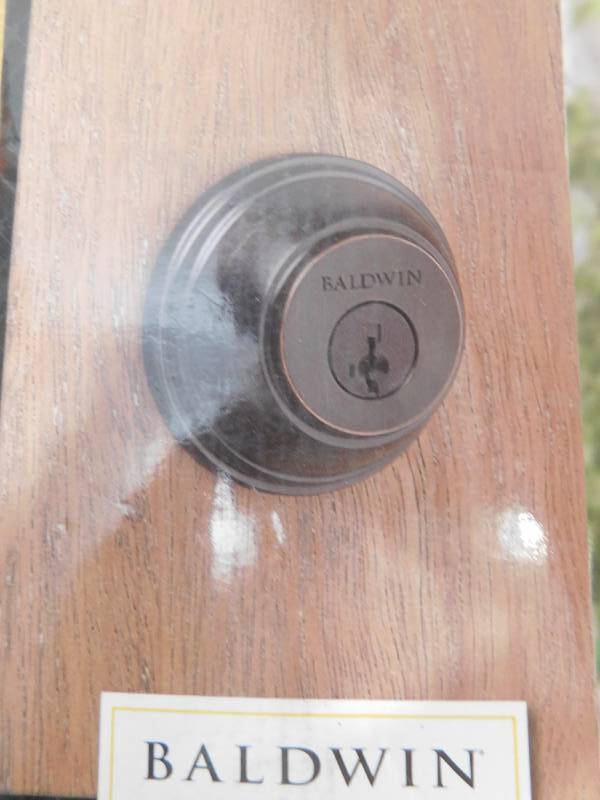 lot 183 image: Baldwin Prestige Venetian Bronze Single Cylinder Round Deadbolt Featuring SmartKey Security