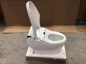 lot 101 image: Athena Intelligent Comfort Height 1-Piece 1.0 GPF 1.6 GPF Dual Flush Elongated Toilet in White Seat Included by WOODBRIDGE Customer Returns See Pictures