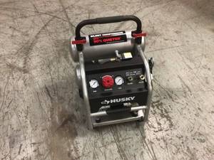 lot 110 image: 4.5 Gal. Portable Electric-Powered Silent Air Compressor by Husky Customer Returns See Pictures