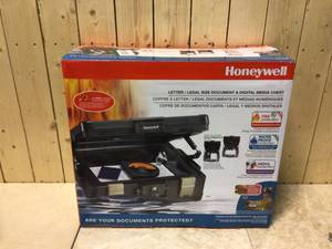 lot 28 image: 0.39 cu. ft. Molded Fire Resistant and Waterproof Legal Document Storage Chest with Key and Double Latch Lock by Honeywell Customer Returns See Pictures